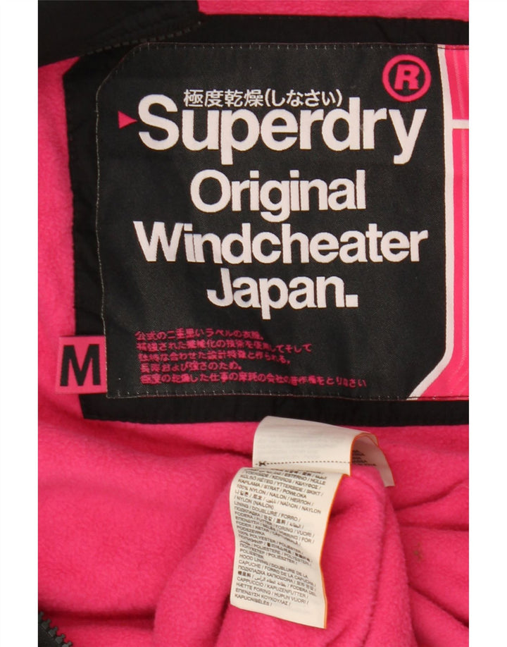 Superdry Veste coupe-vent à capuche Windcheater pour femme UK 14 Medium Noir