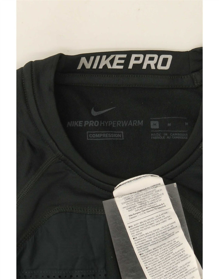 Nike Haut graphique à manches longues en polyester color block vert moyen pour homme