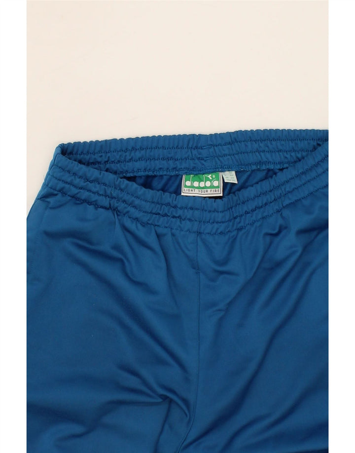 DIADORA Mens Tracksuit Trousers UK 36 Small Blue Polyester Vintage Diadora and Second-Hand Diadora from Messina Hembry 