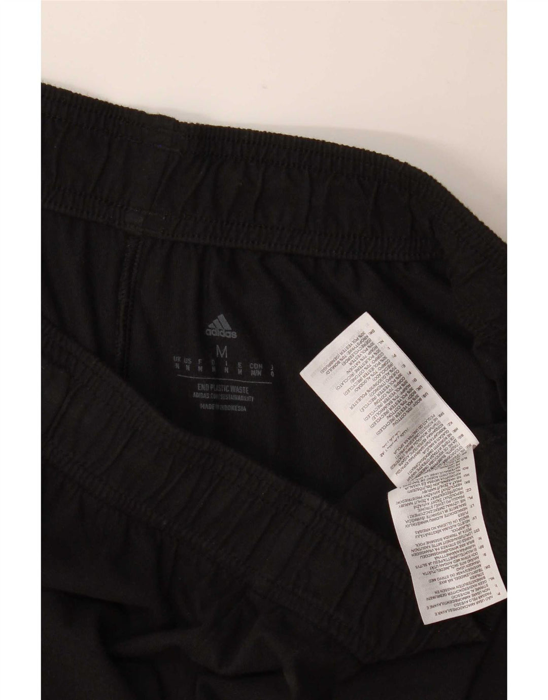 Adidas Short de sport graphique pour homme en coton noir moyen