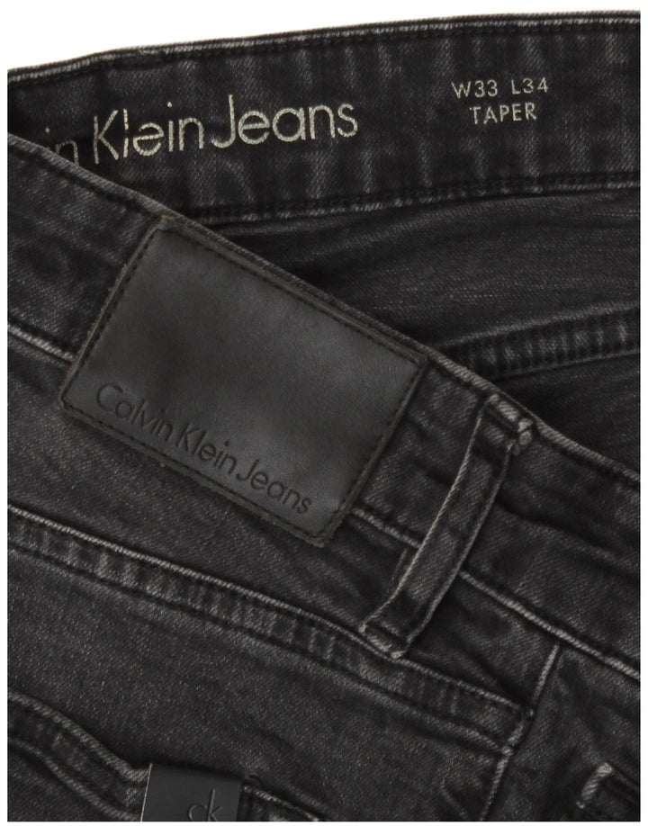 Calvin Klein Jean fuselé W33 L29 homme gris coton
