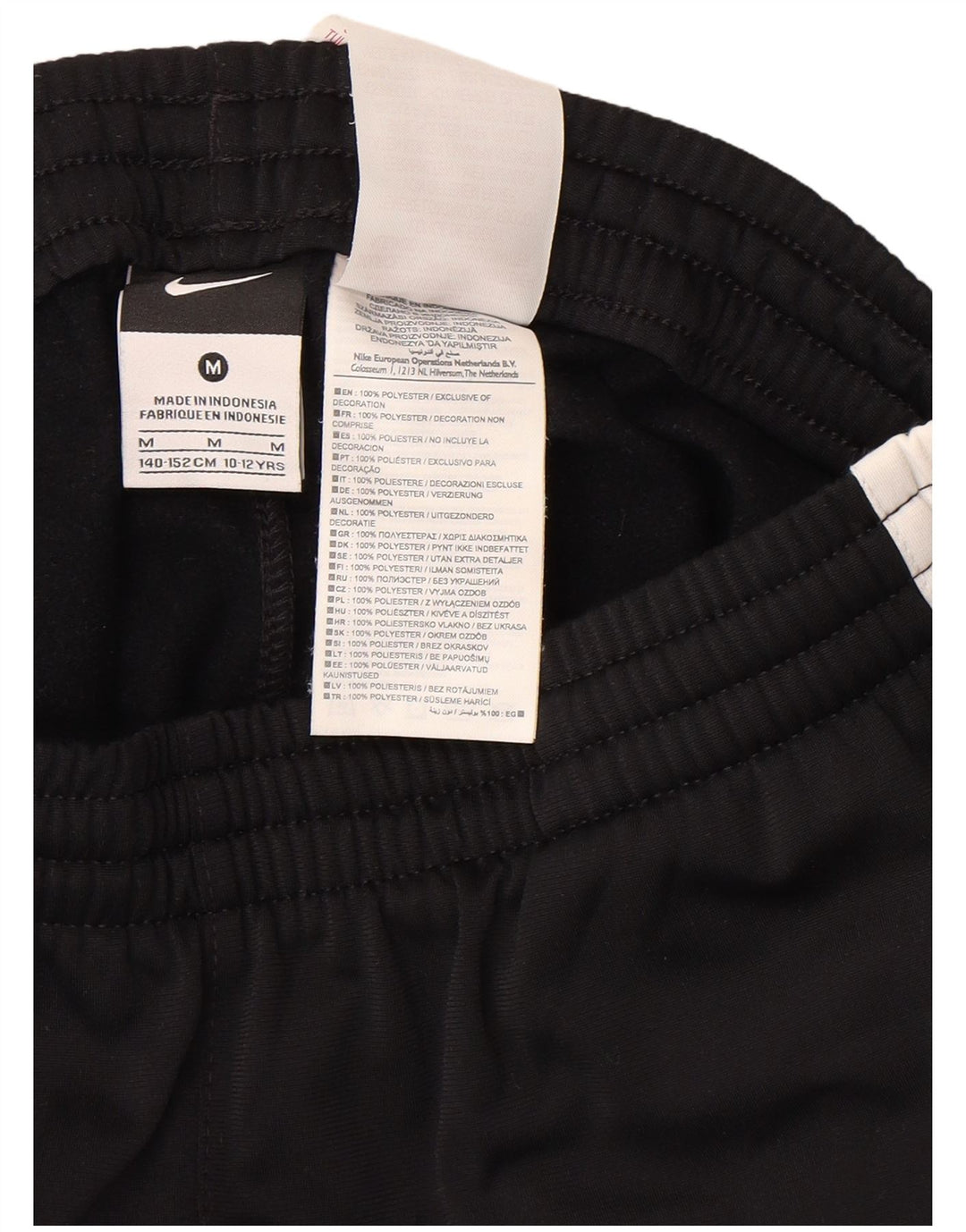 Nike Pantalon de survêtement graphique pour garçon 10-11 ans Noir moyen colour block