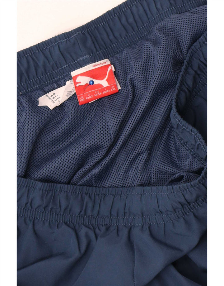 Puma Pantalon de survêtement Graphic Capri pour homme 2XL Bleu marine Polyester