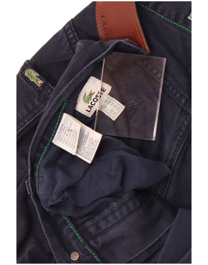 Lacoste Jean slim homme W38 L33 bleu marine coton