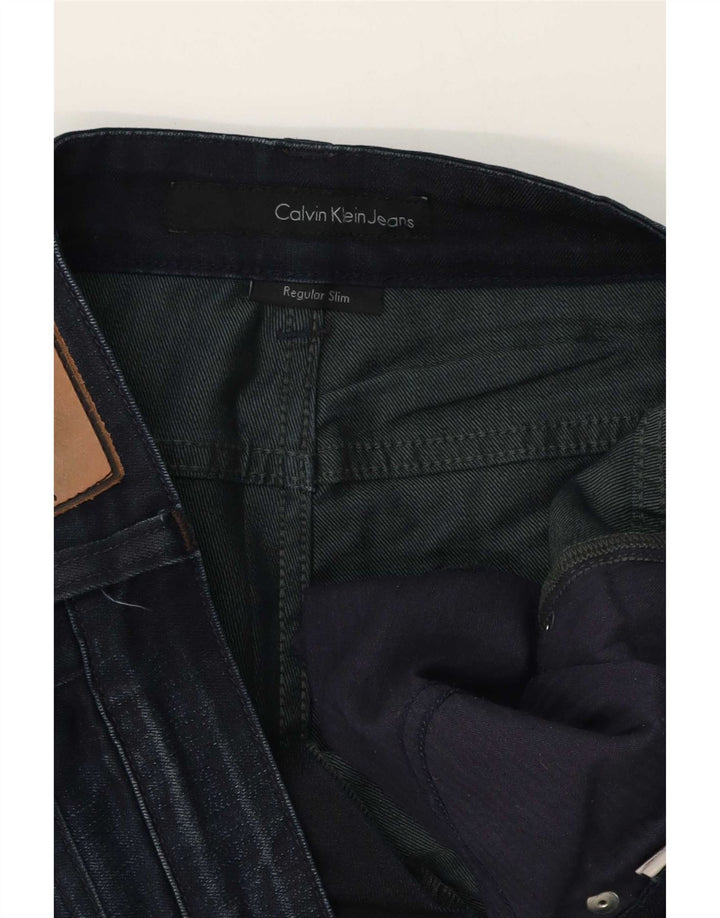 Calvin Klein Jean Slim Regular Homme W32 L30 Bleu