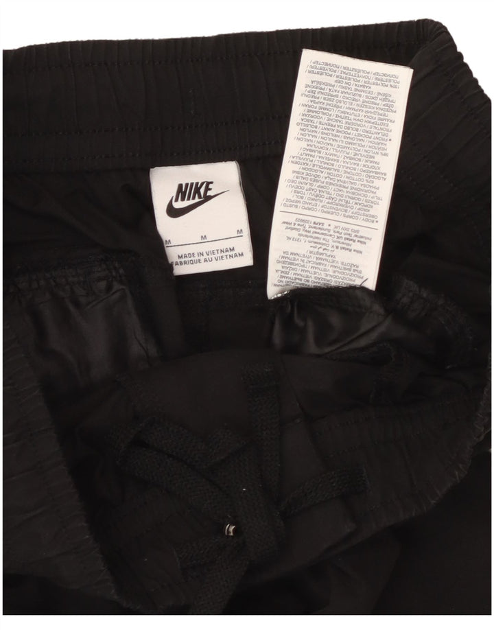 Nike Pantalon cargo fuselé en coton noir moyen