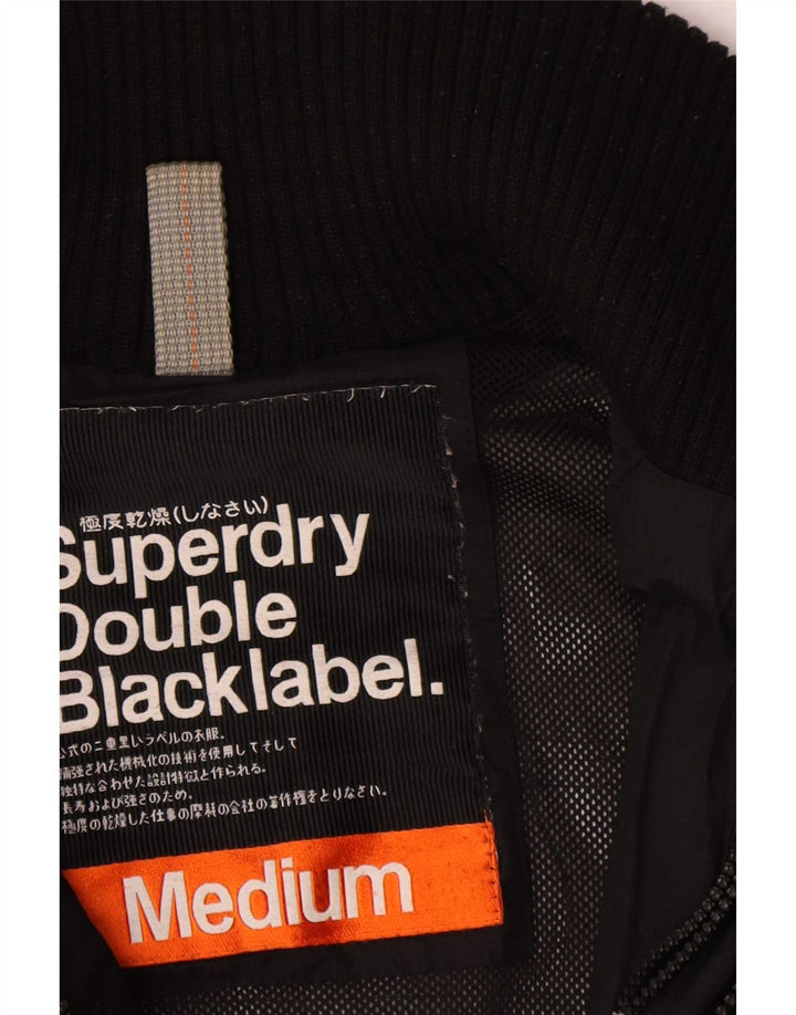 Superdry Veste coupe-vent pour femme UK 14 Medium Noir Polyester