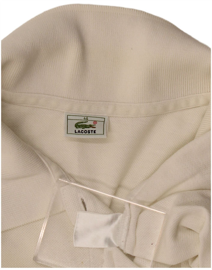 Lacoste Polo sans manches femme taille 46 XL blanc
