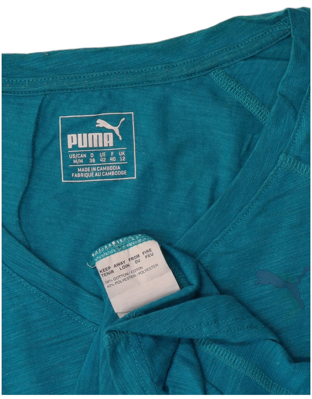 Puma T-shirt pour femme en coton moucheté bleu moyen UK 12