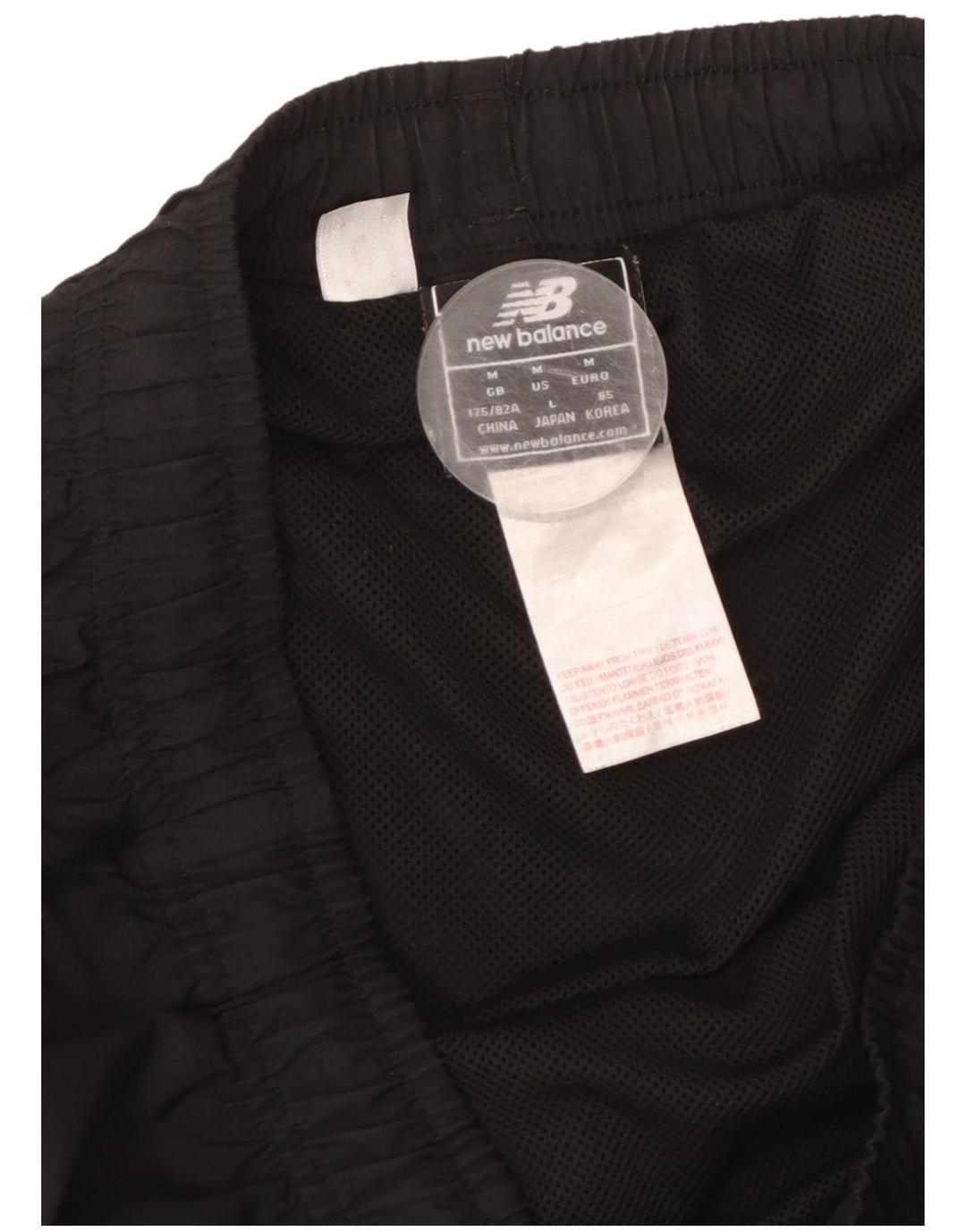 NEW BALANCE Short de Sport Liverpool Homme Noir Moyen Polyester