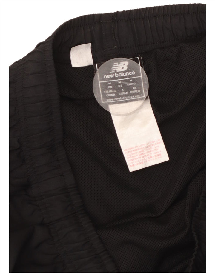 NEW BALANCE Short de Sport Liverpool Homme Noir Moyen Polyester