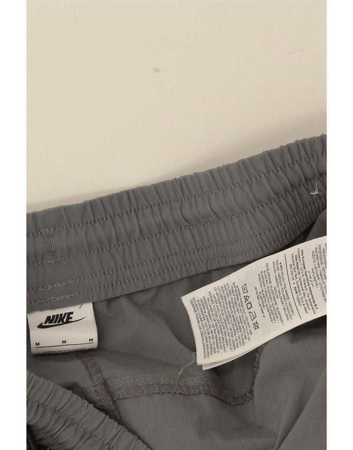 Pantalon de survêtement cargo Nike Homme Pantalon de jogging en nylon gris moyen