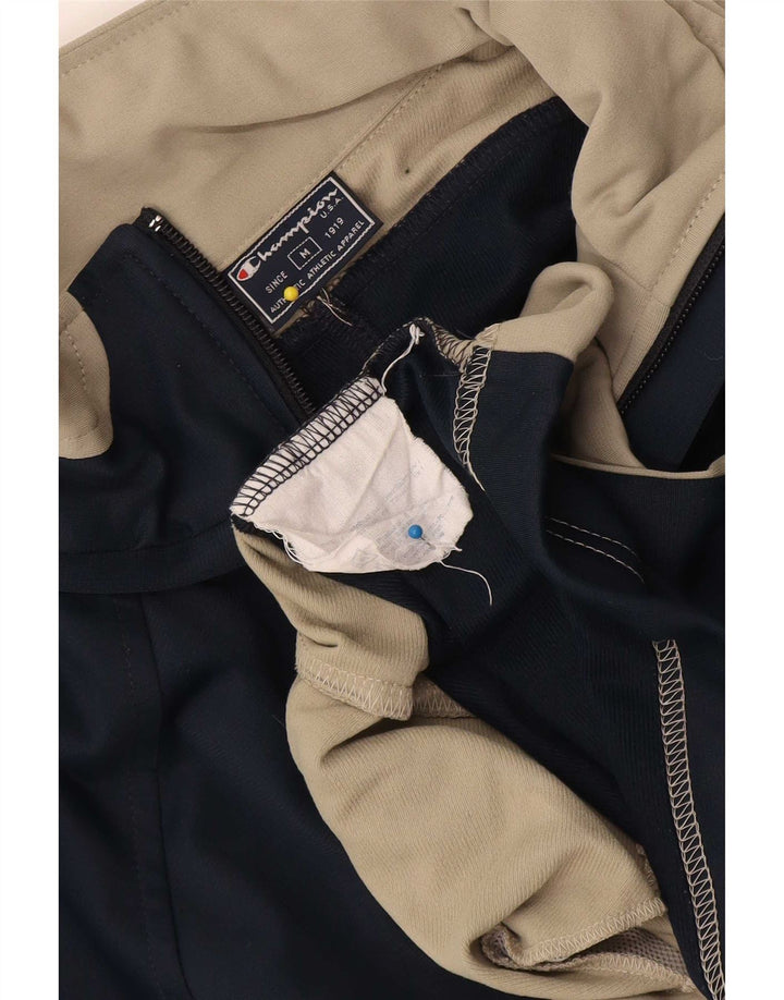 Champion Veste de Survêtement Graphique Homme Bleu Marine Moyen Colourblock