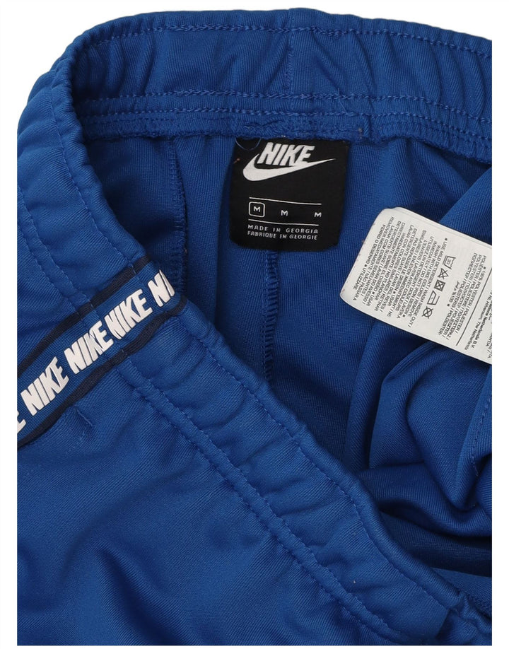 Pantalon de survêtement graphique Nike Homme Pantalon de jogging Bleu moyen Polyester