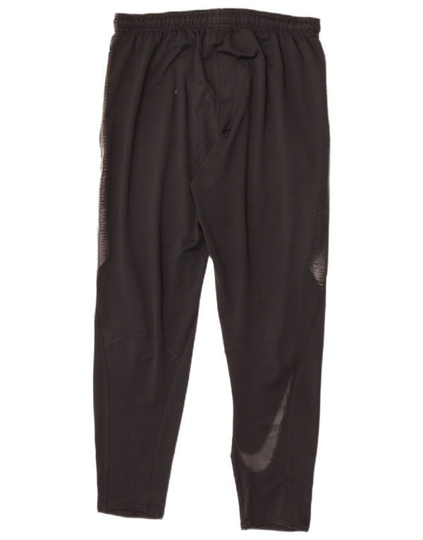 Nike Pantalon de survêtement Dri Fit pour homme en polyester color block noir moyen