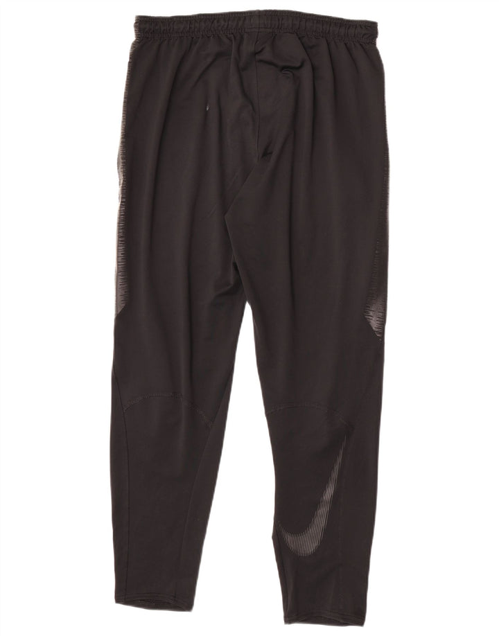 Nike Pantalon de survêtement Dri Fit pour homme en polyester color block noir moyen