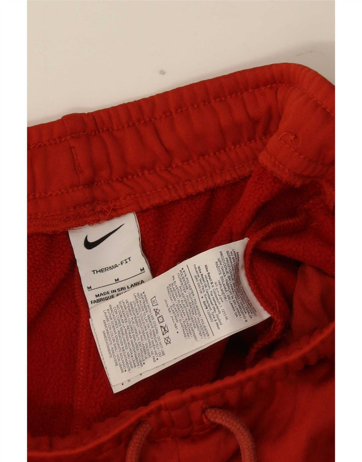 Nike Pantalon de survêtement Therma-Fit Graphic pour homme en polyester rouge moyen