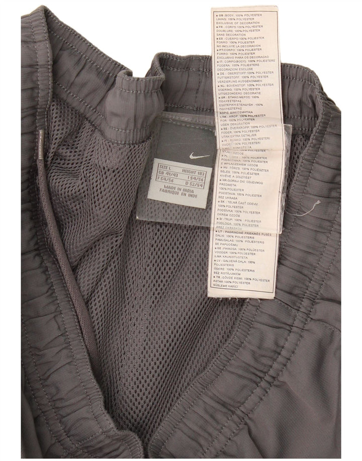 Nike Pantalon de survêtement pour homme Pantalon de jogging Large Gris Polyester