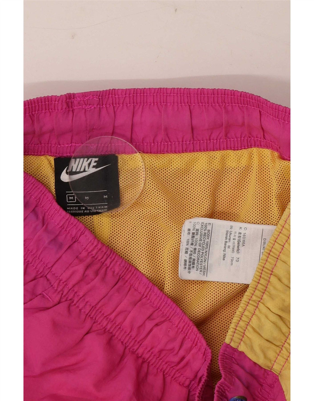 Nike Short de sport en nylon color block rose moyen |