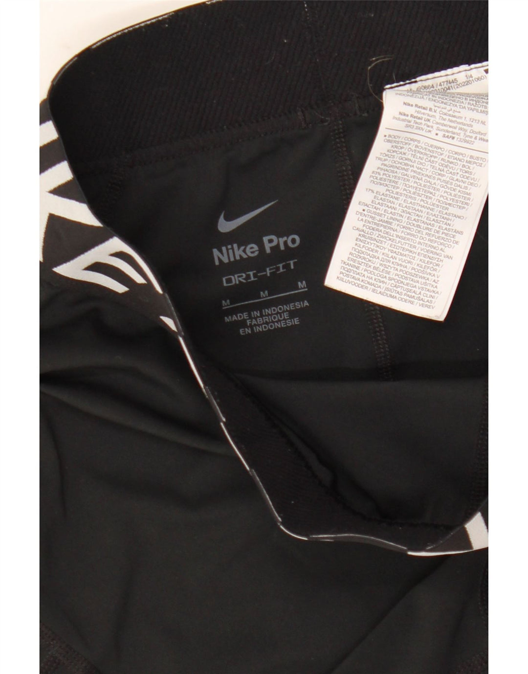 Nike Short de sport Dri Fit Graphic pour femme UK 12 Noir moyen Polyester