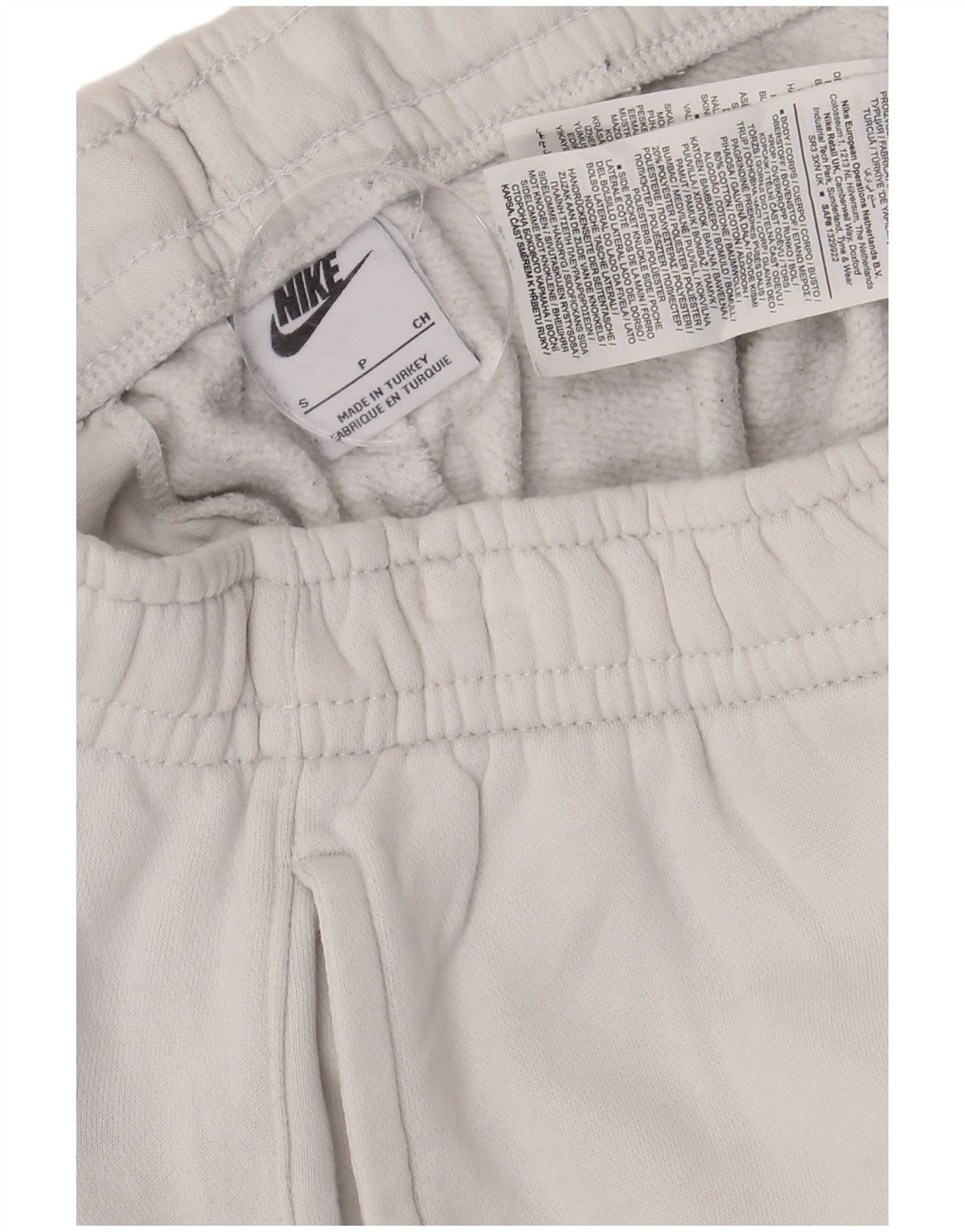 Nike Pantalon de survêtement graphique pour homme Taille S en coton blanc