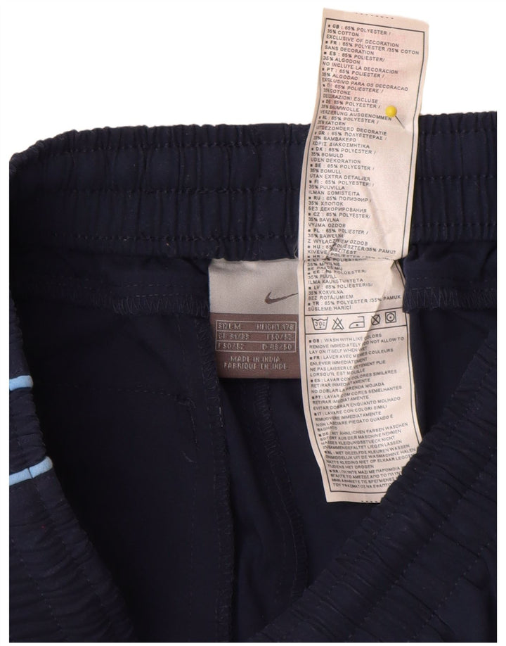 Nike Pantalon de survêtement Graphic Capri pour homme Bleu marine moyen Colourblock