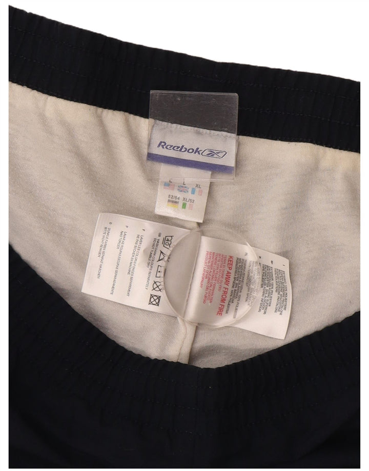 Reebok Pantalon de Survêtement Homme Joggers Large Bleu Marine Polyester