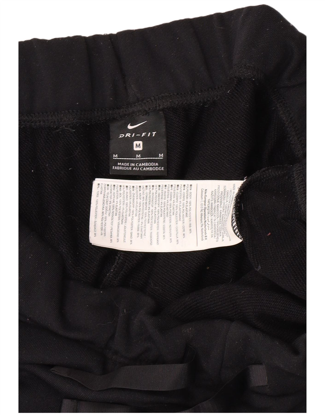Pantalon de survêtement Nike Dri Fit pour femme en polyester noir moyen