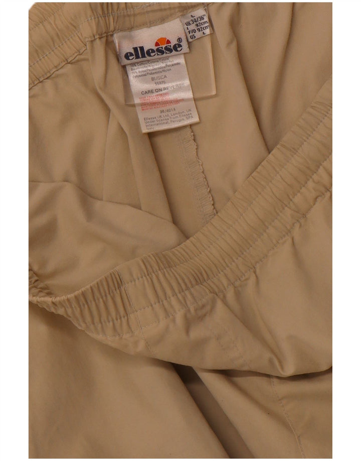 ELLESSE Bermuda Sport Homme Large Beige Coton