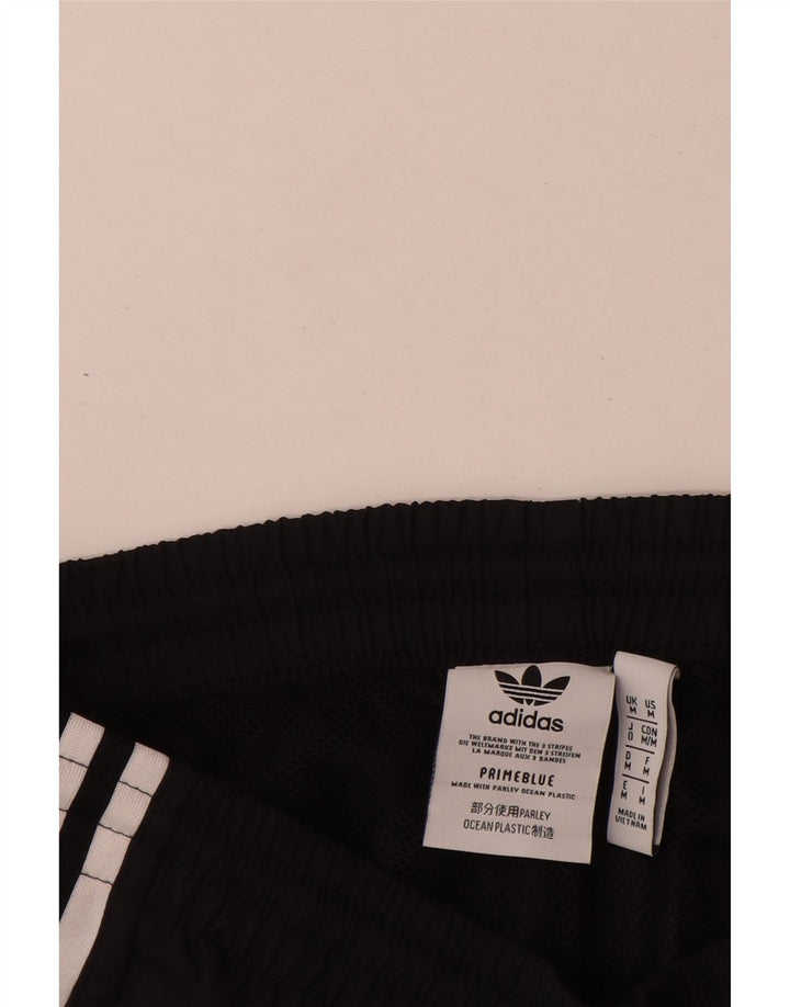 Adidas Pantalon de survêtement graphique pour homme Noir moyen Polyester