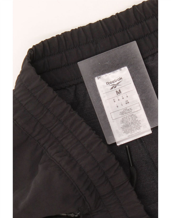 Reebok Pantalon de Survêtement Homme Noir Moyen Polyamide