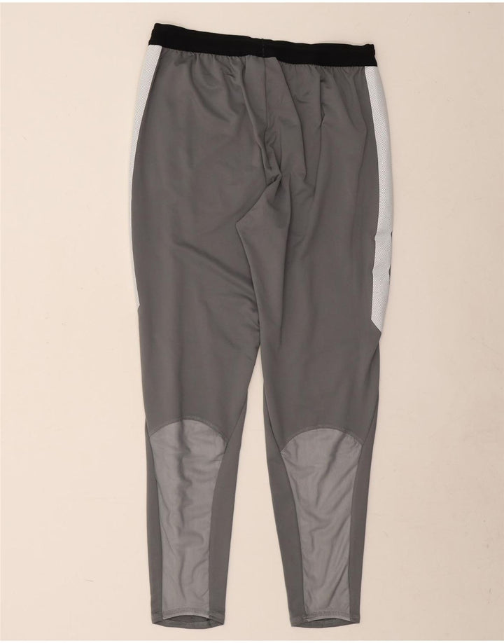 Nike Pantalon de survêtement Dri Fit pour homme en polyester color block Taille L