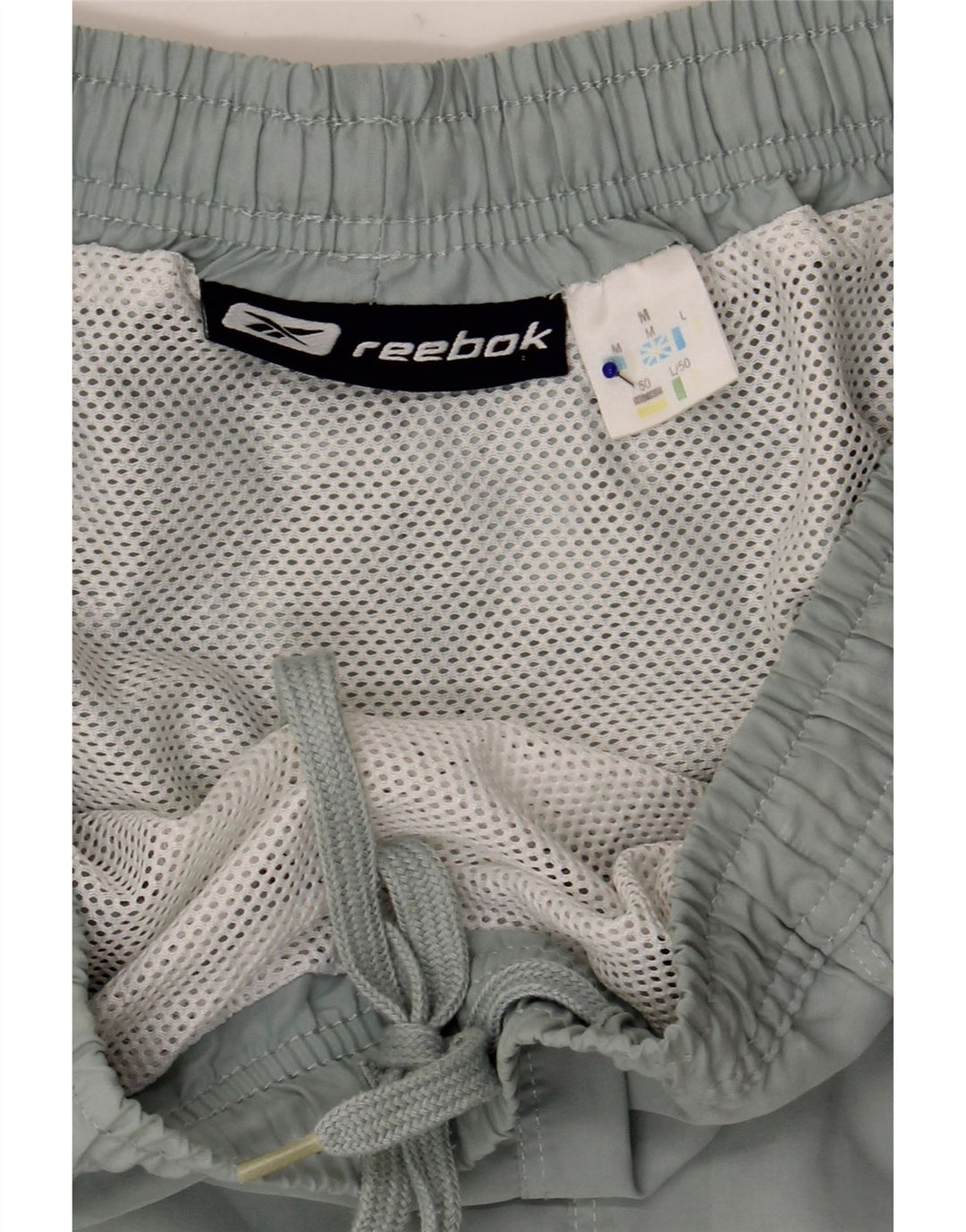 Reebok Short de Sport Homme Bleu Moyen Polyester