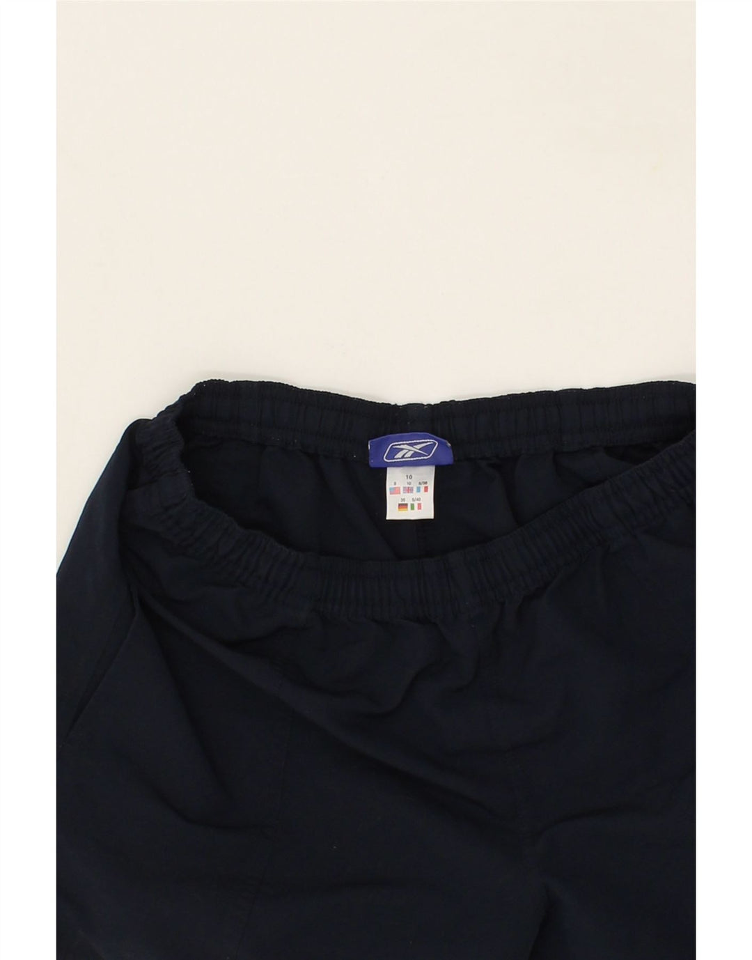 REEBOK Girls Sport Shorts 9-10 Years Navy Blue Polyester Vintage Reebok and Second-Hand Reebok from Messina Hembry 
