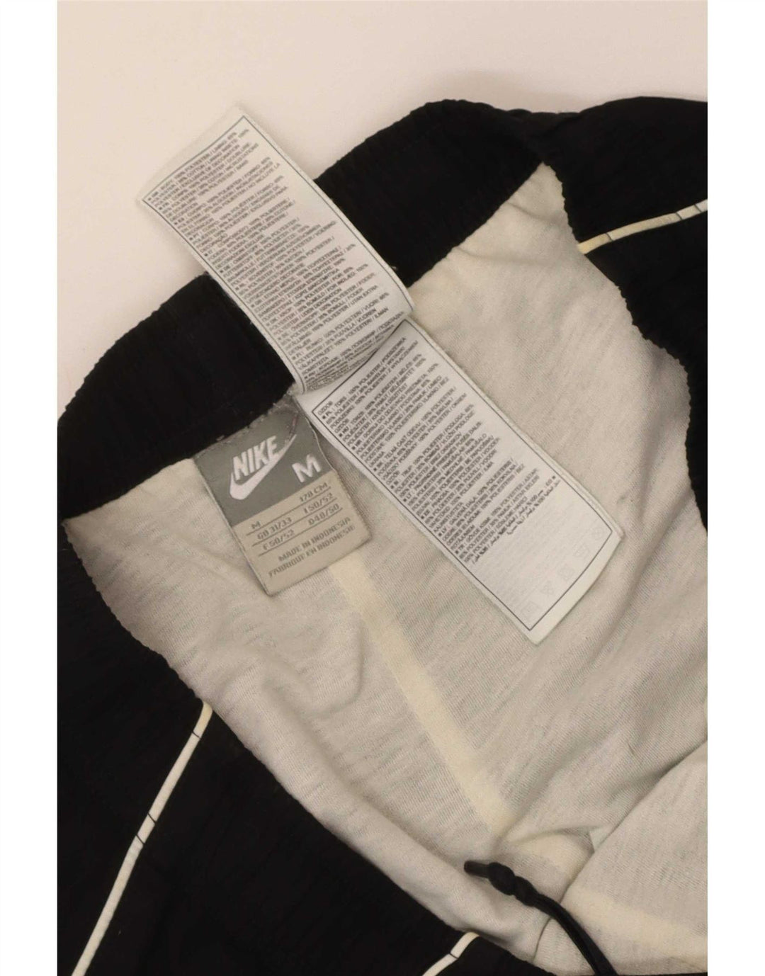 Nike Pantalon de survêtement graphique pour homme Noir moyen Polyester