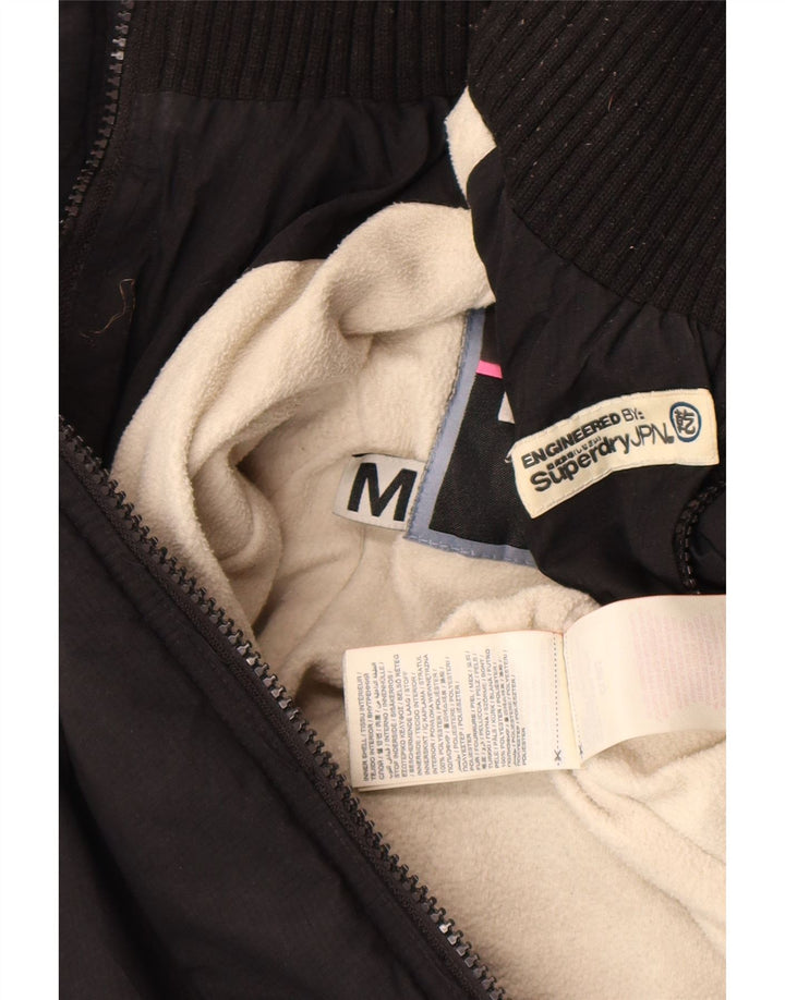 Superdry Veste coupe-vent à capuche graphique pour femme UK 14 Noir moyen