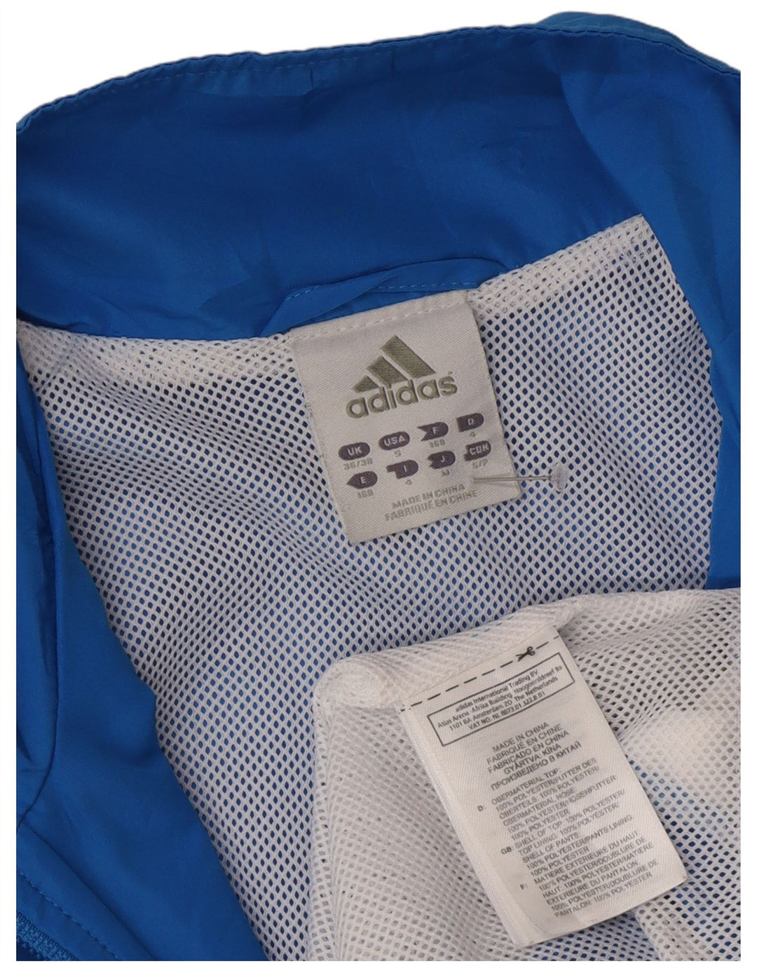 Adidas Veste de pluie pour homme UK 36/38 Petit Bleu Colorblock Polyester