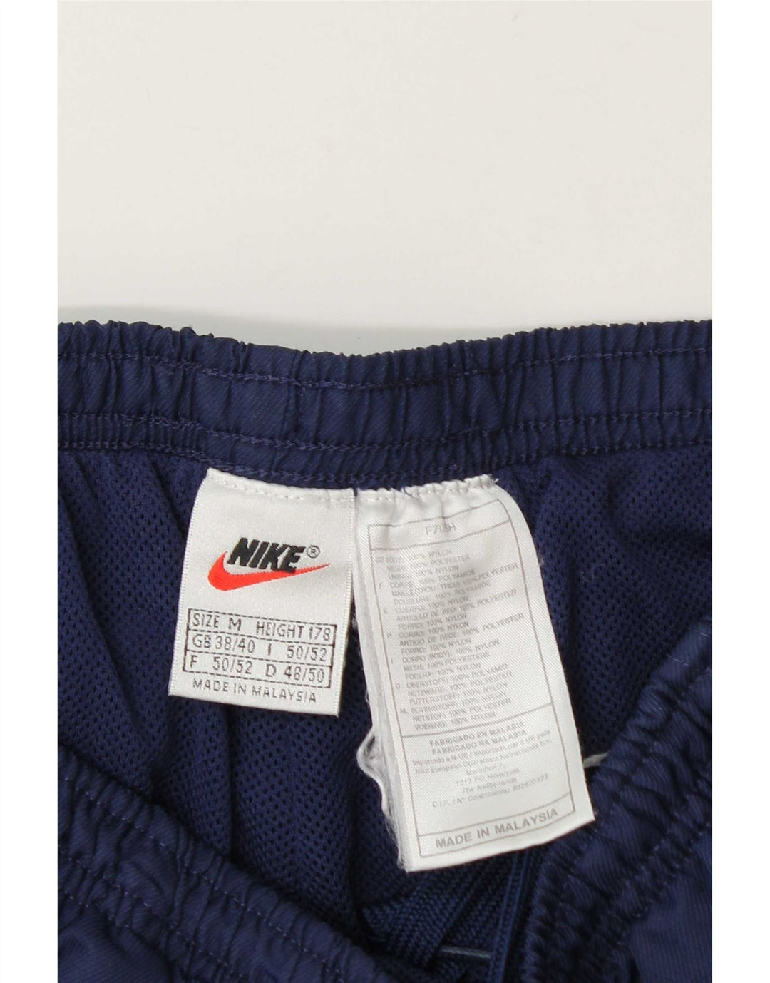 Nike Pantalon de survêtement pour homme UK 38/40 Medium Bleu Marine Nylon