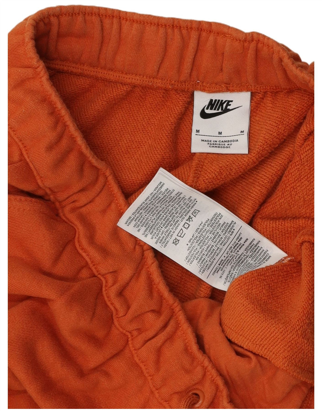 Nike Pantalon de survêtement graphique en coton orange moyen pour homme