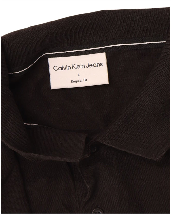 Calvin Klein Jeans Polo graphique coupe régulière pour homme en coton noir Taille L