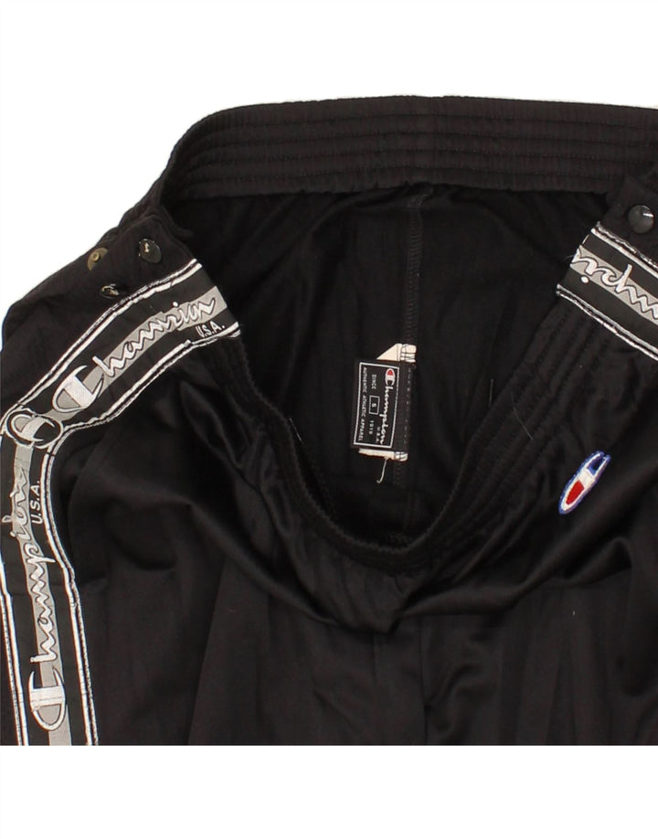 CHAMPION Mens Graphic Tracksuit Trousers Small Black Polyester Vintage Champion and Second-Hand Champion from Messina Hembry 