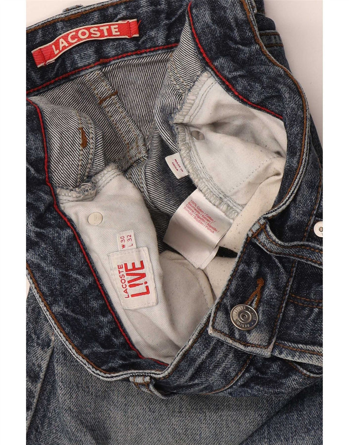 Lacoste Jean slim homme W30 L32 bleu coton