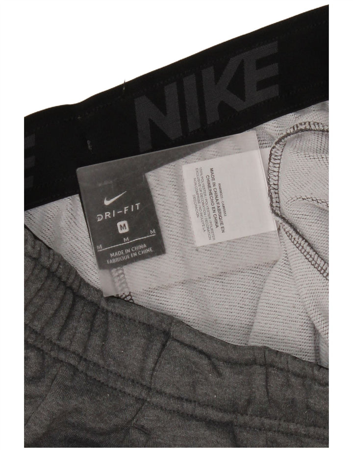 Pantalon de survêtement Nike Dri Fit pour femme UK 14 Gris moyen Polyester