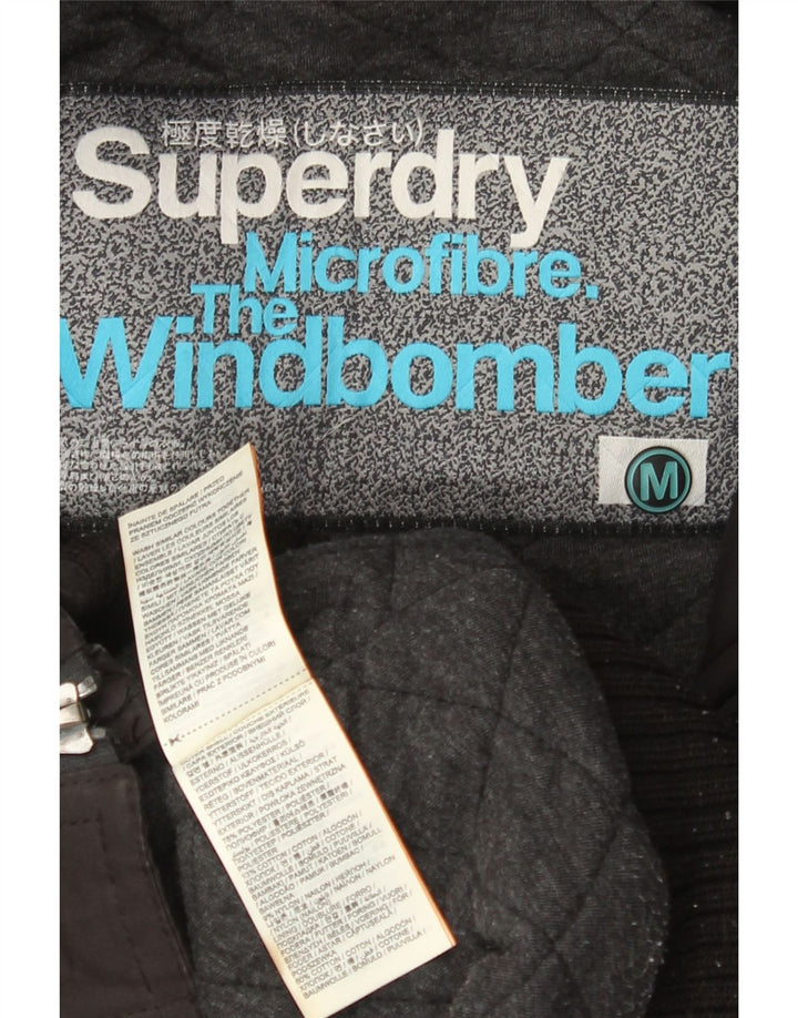 Superdry Veste coupe-vent à capuche The Windbomber pour femme UK 14 Noir moyen