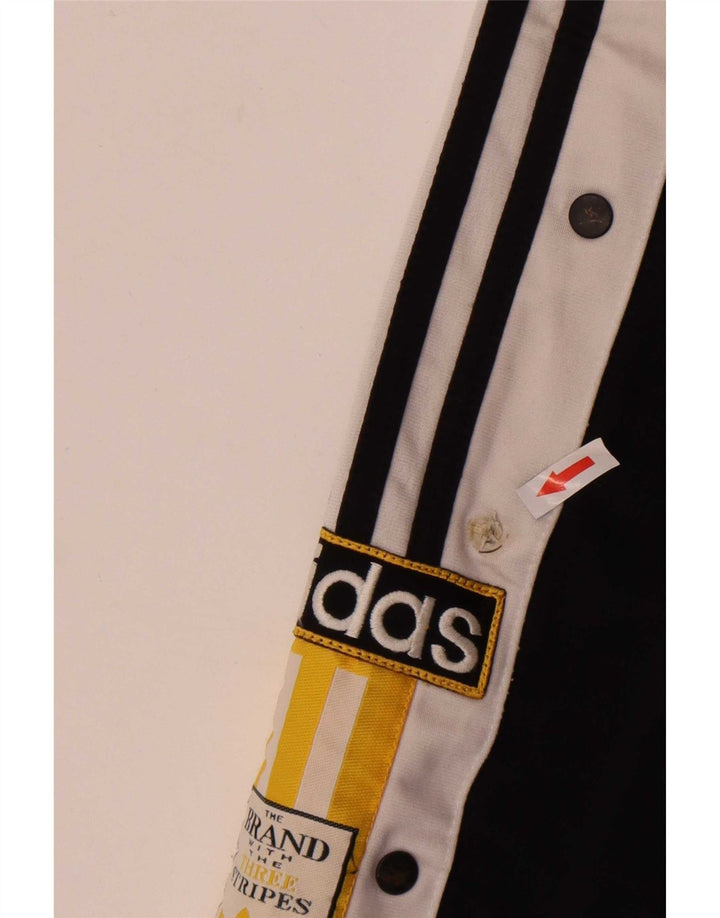 Adidas Pantalon de Survêtement Graphique Homme Noir Moyen Polyester Colorblock