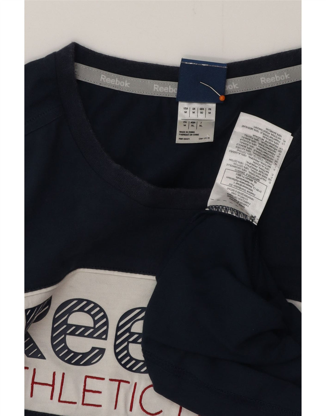 REEBOK Mens Graphic T-Shirt Top Medium Navy Blue Colourblock Cotton Vintage Reebok and Second-Hand Reebok from Messina Hembry 