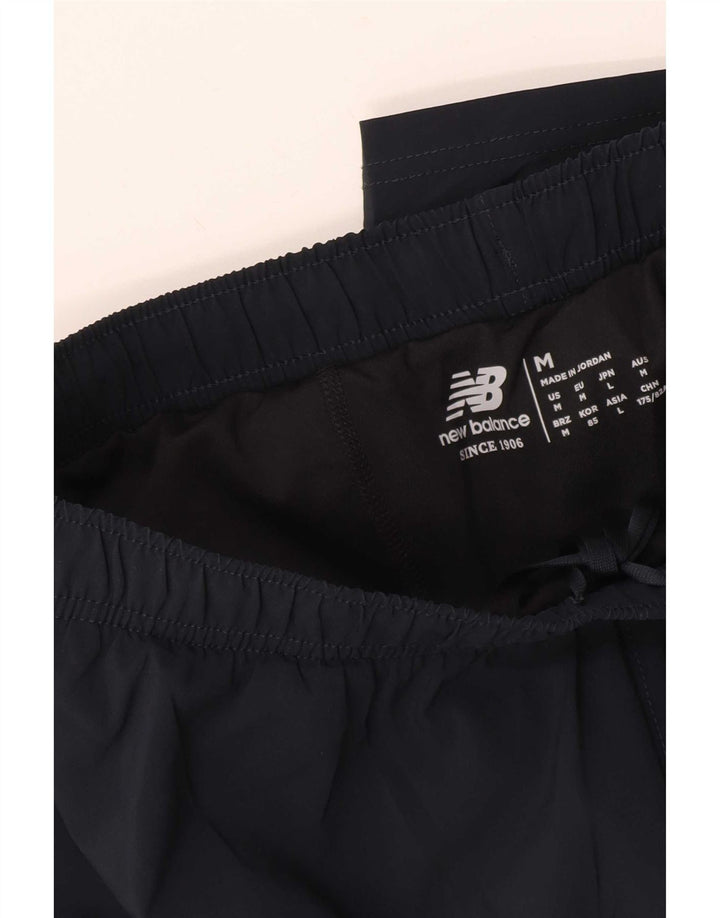 New Balance Short de Sport Homme Bleu Marine Moyen
