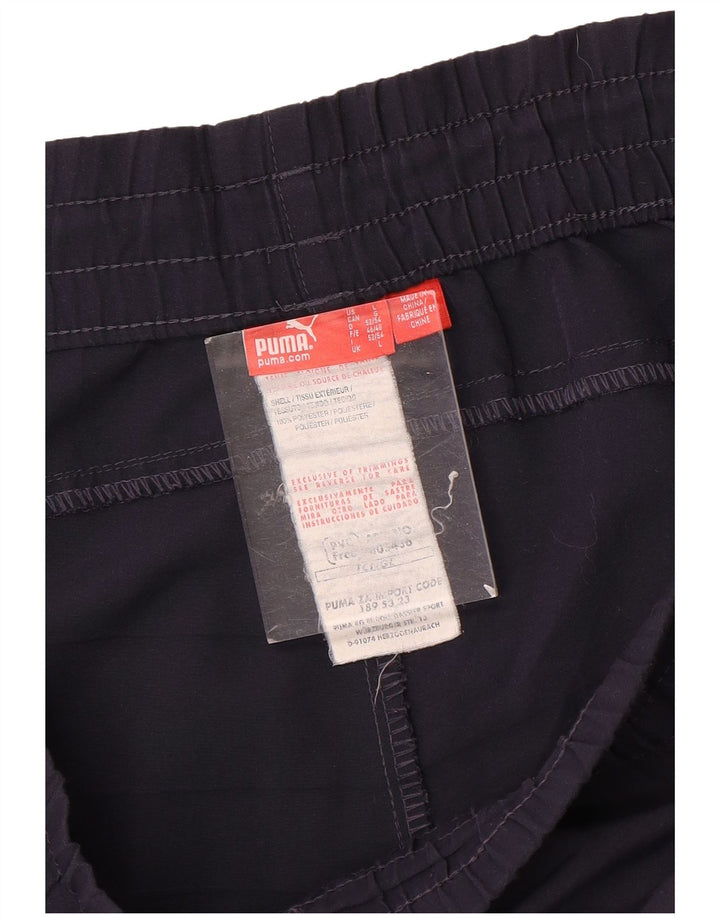 Puma Short de sport pour homme en polyester color block Taille L Bleu marine