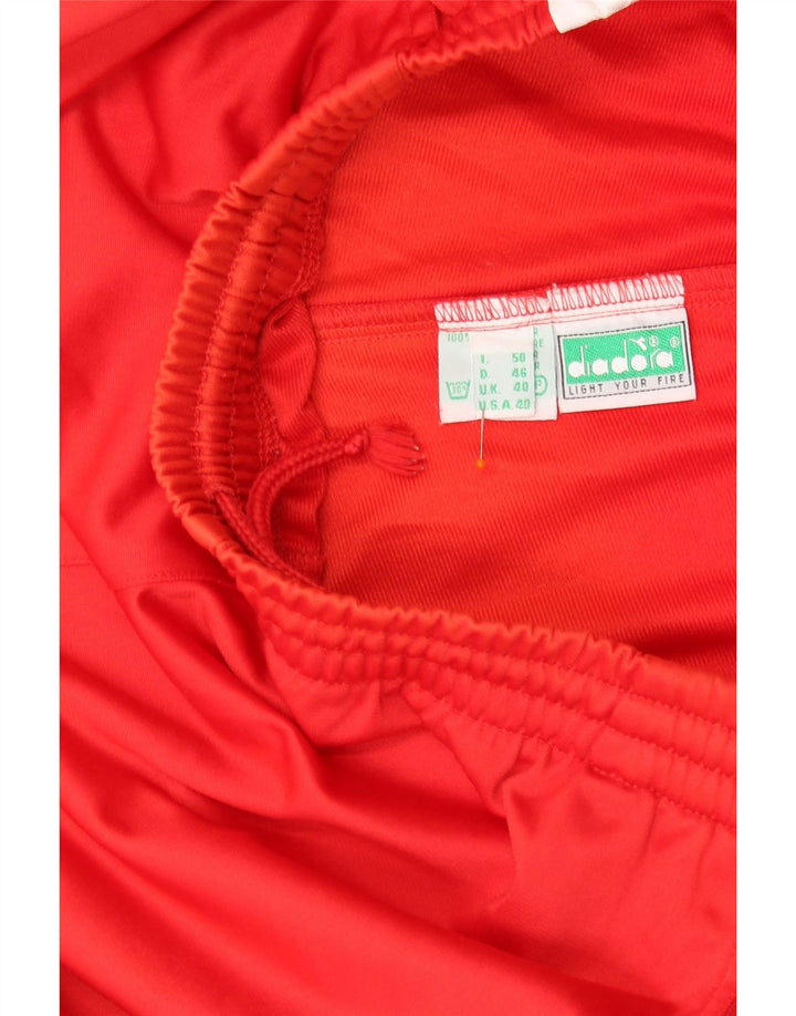 DIADORA Pantalon de survêtement graphique pour homme UK 40 Rouge moyen Colourblock