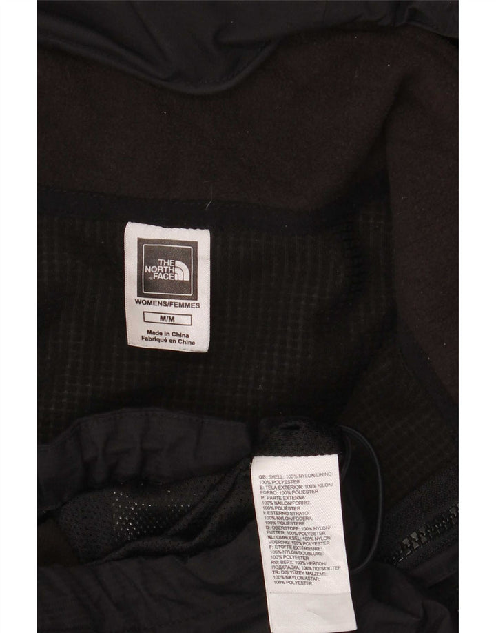 The North Face Veste coupe-vent à capuche pour femme UK 12 Medium Noir